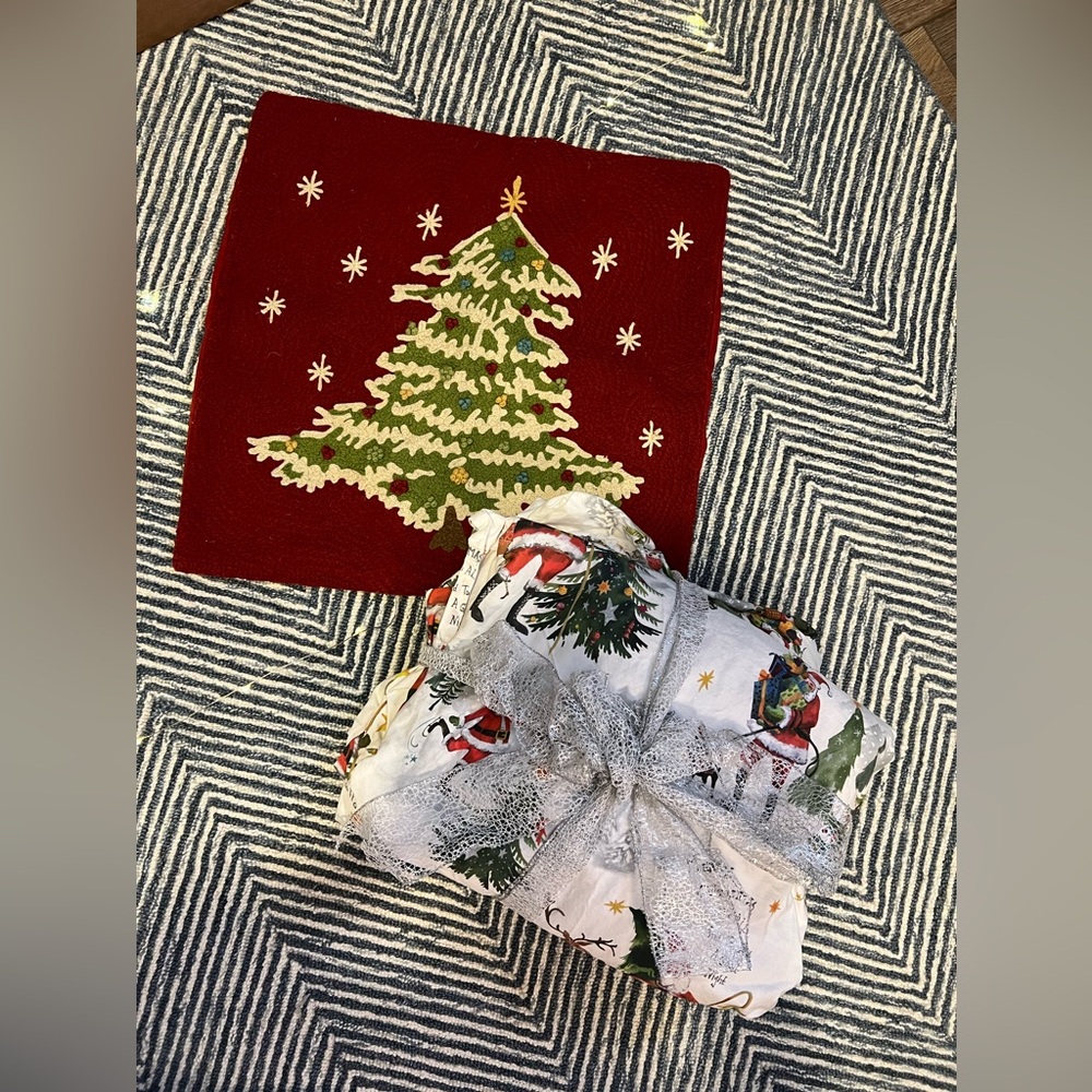 NWOT pottery barn jolly Santa queen sheet set and bonus pillow.